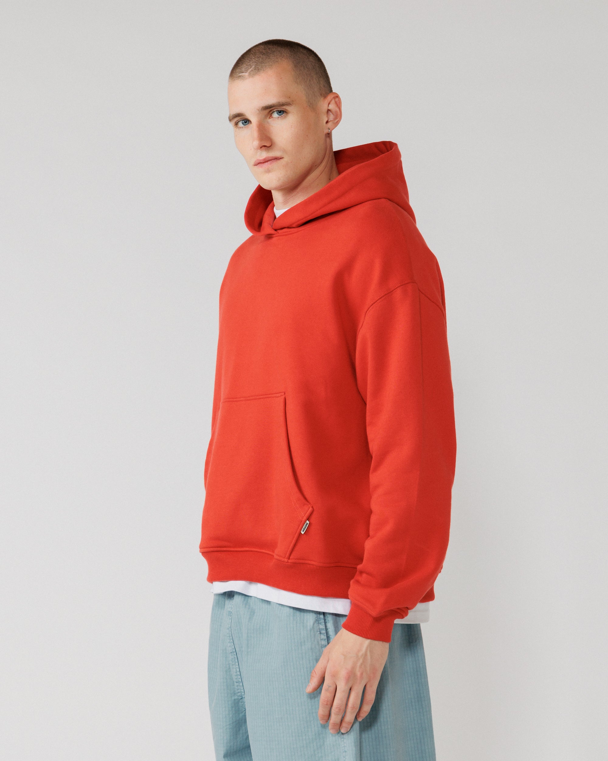 520 Organic Hoody - Signal Red — men's 3/4 angle drape
