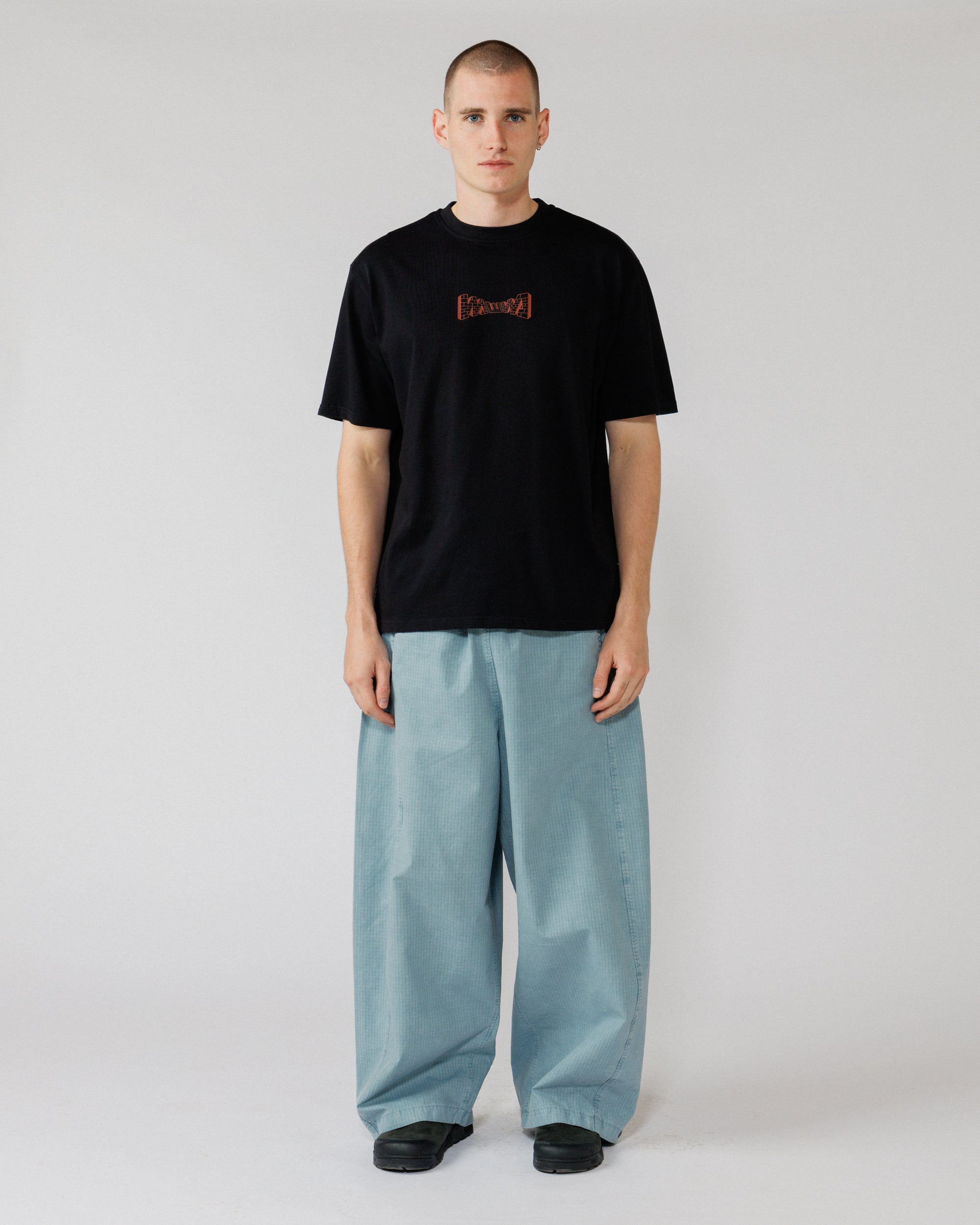 Brick Logo T-Shirt - Black — full-length front, fit context