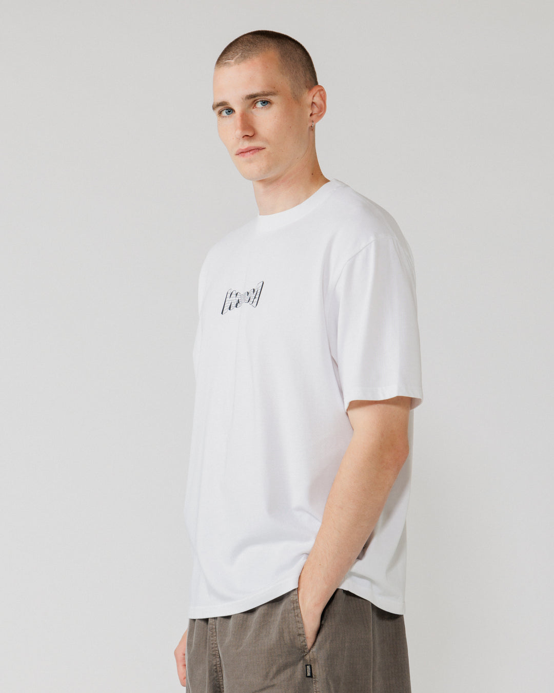 Brick Logo T-Shirt - White — three-quarter angle, drape view