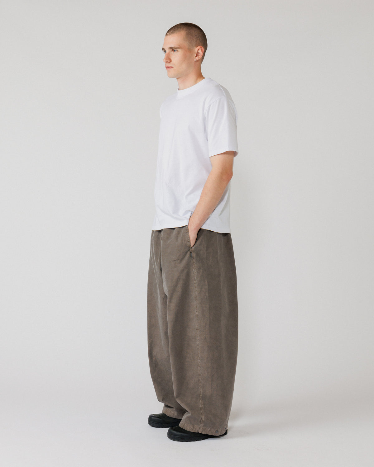Garment Dyed Atlas Pants - Fawn Brown — 3/4 angle shows volume