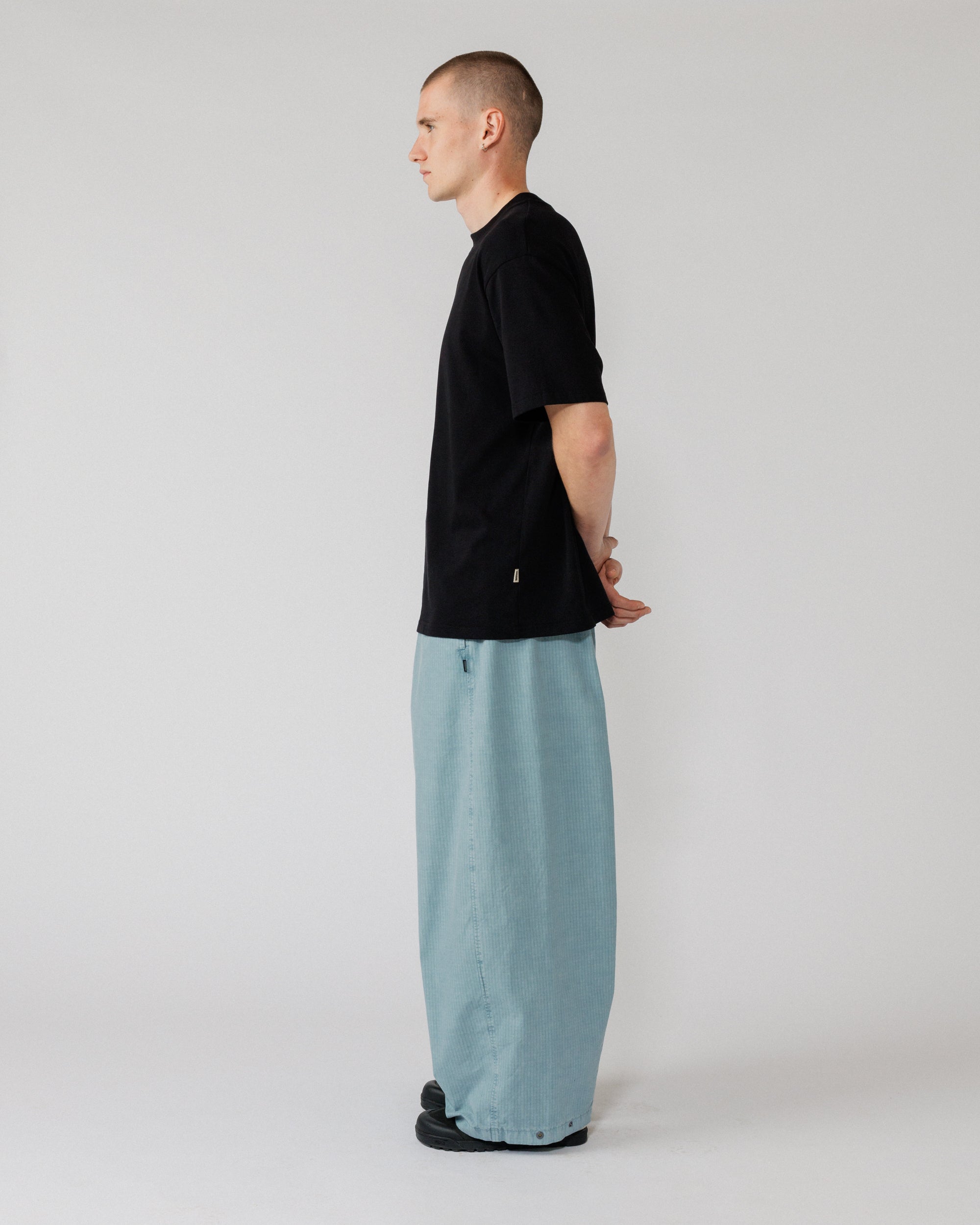 Garment Dyed Atlas Pants - Powder Blue — side profile, balloon taper