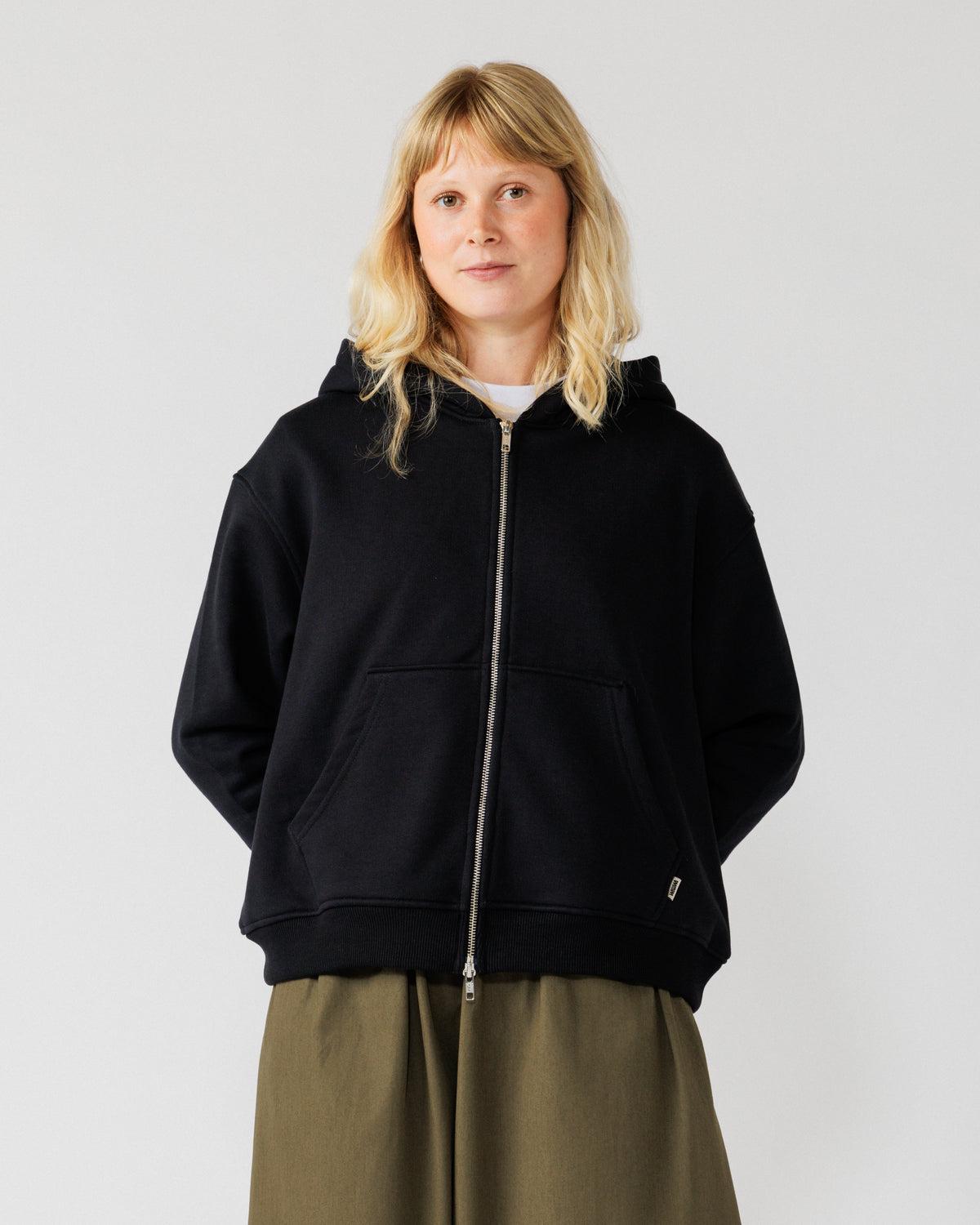 Heavyweight Two-Way Zip Hoody - Black — Female front crop, direct gaze