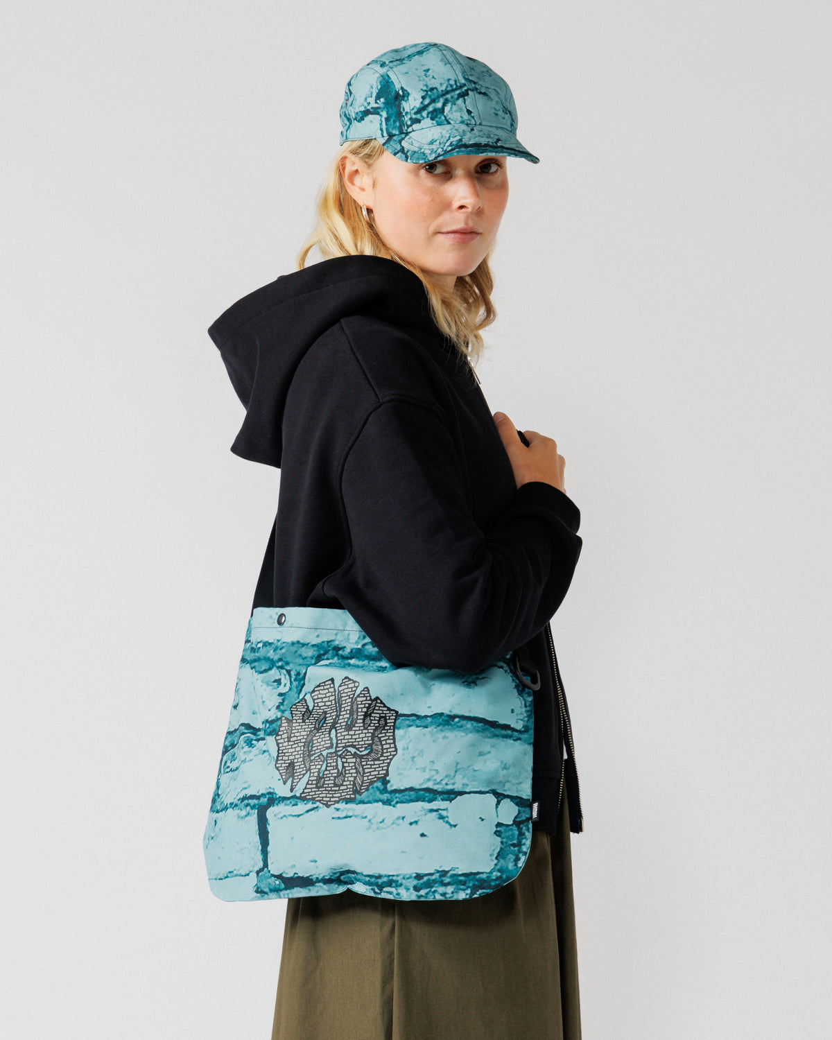 Musette - Blue Brick Camo — shoulder carry three-quarter view