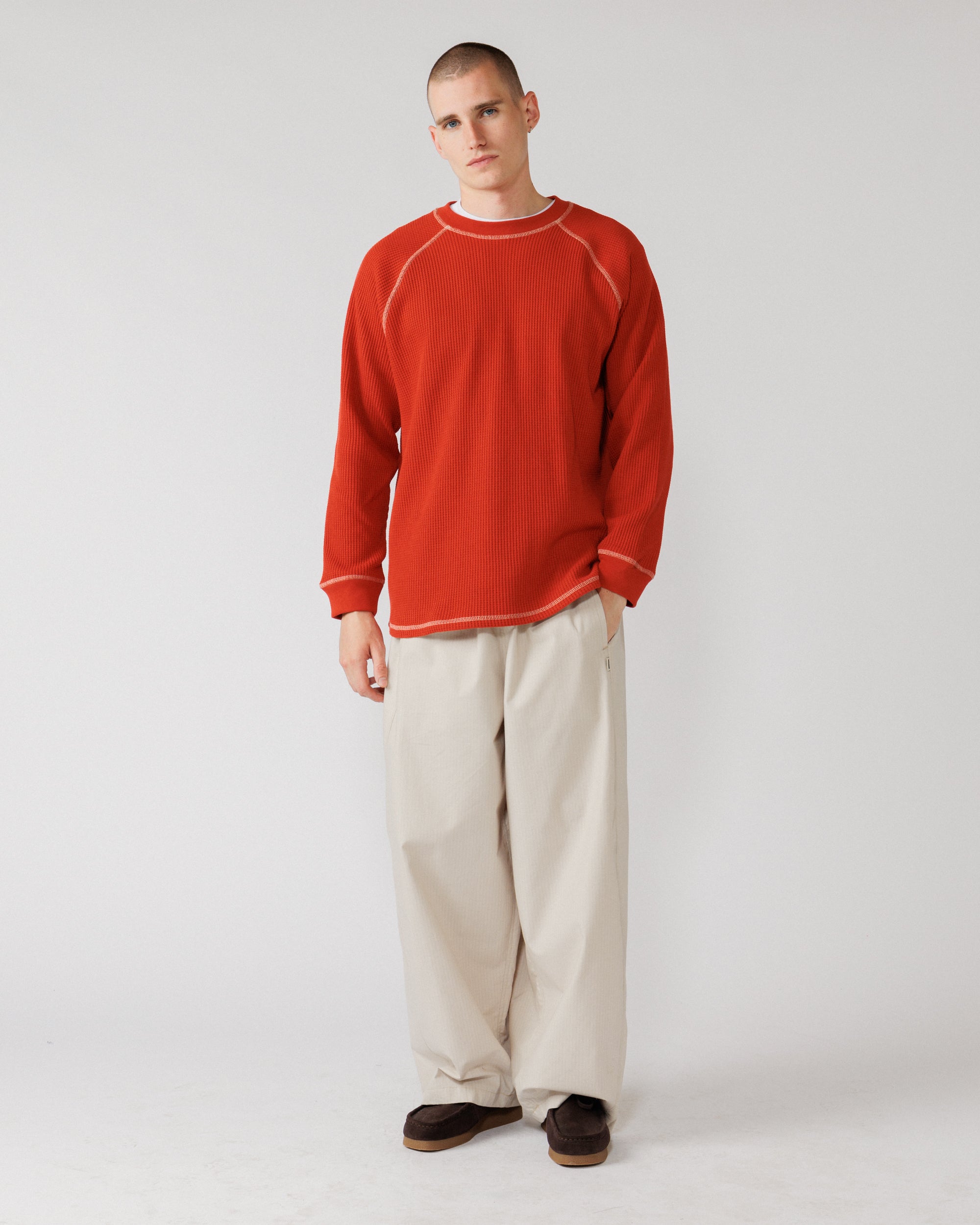 Raglan Range Waffle Knit - Signal Red w Ecru — full-body front, fit context