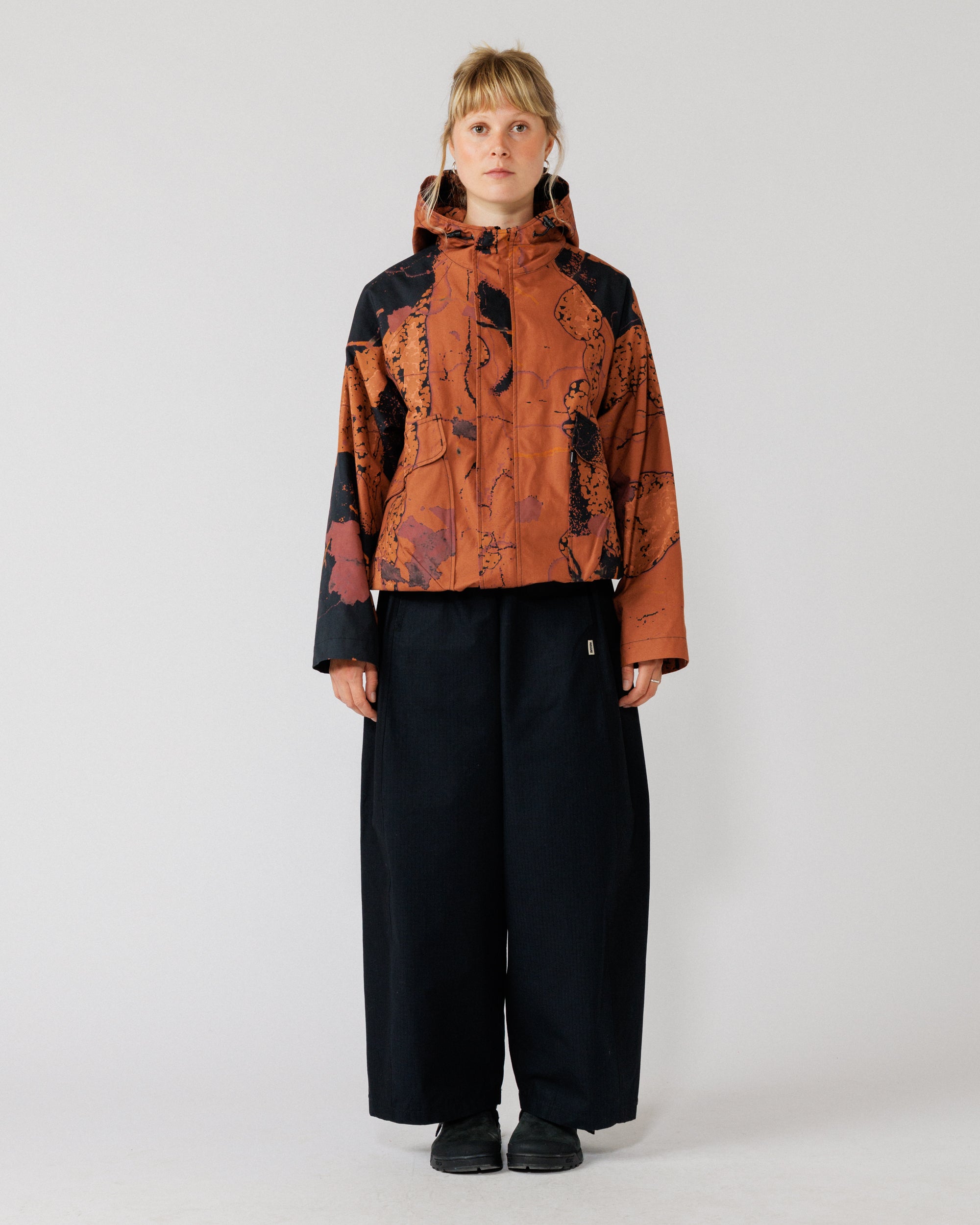 Roam Raglan Jacket - Abstract Brick Camo — hero: full front, zipped, clean