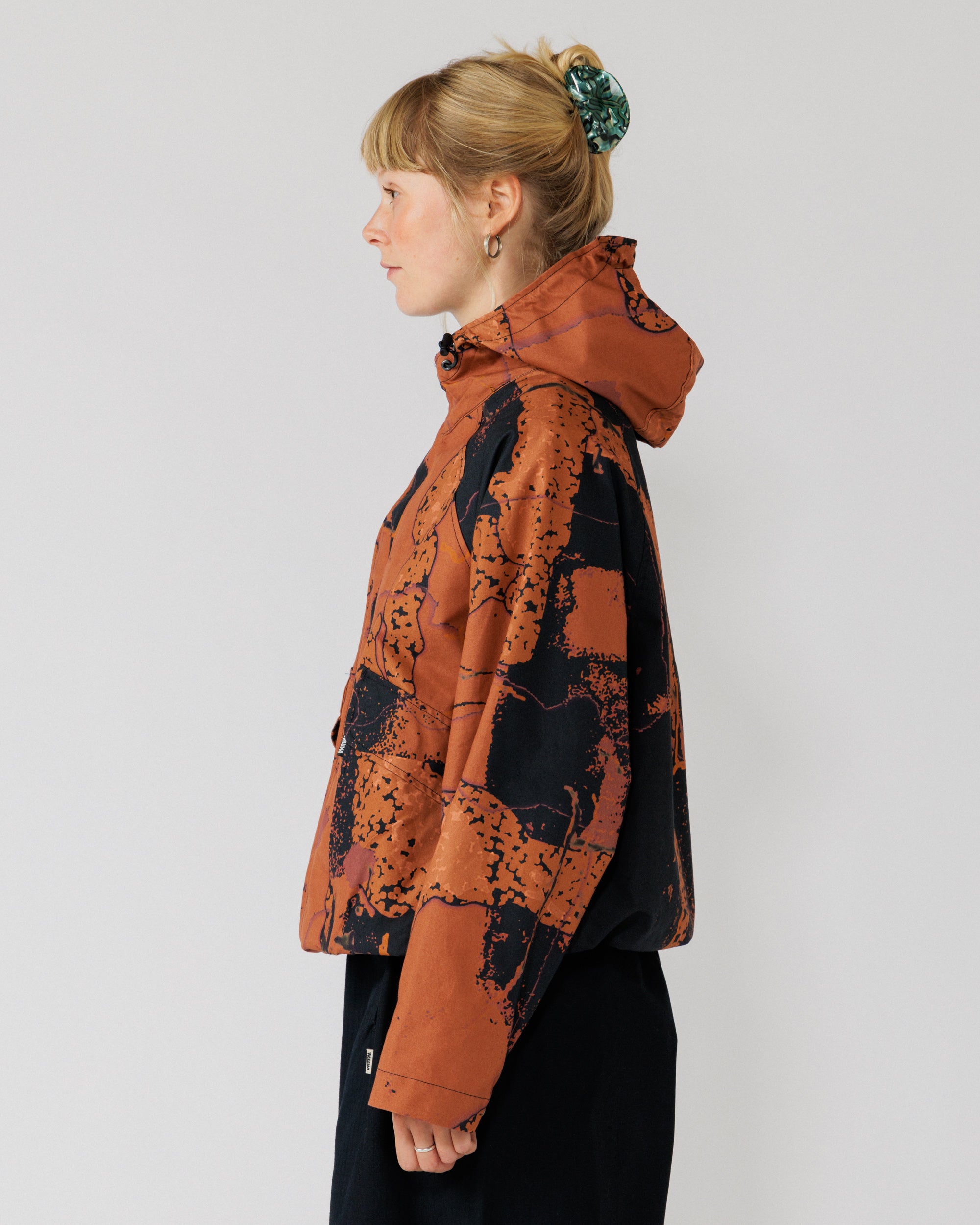 Roam Raglan Jacket - Abstract Brick Camo — side profile, sleeve and hood