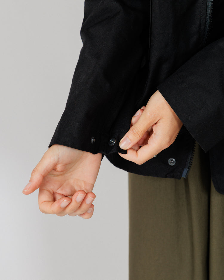 Roam Raglan Jacket - Black — adjustable cuff snap detail