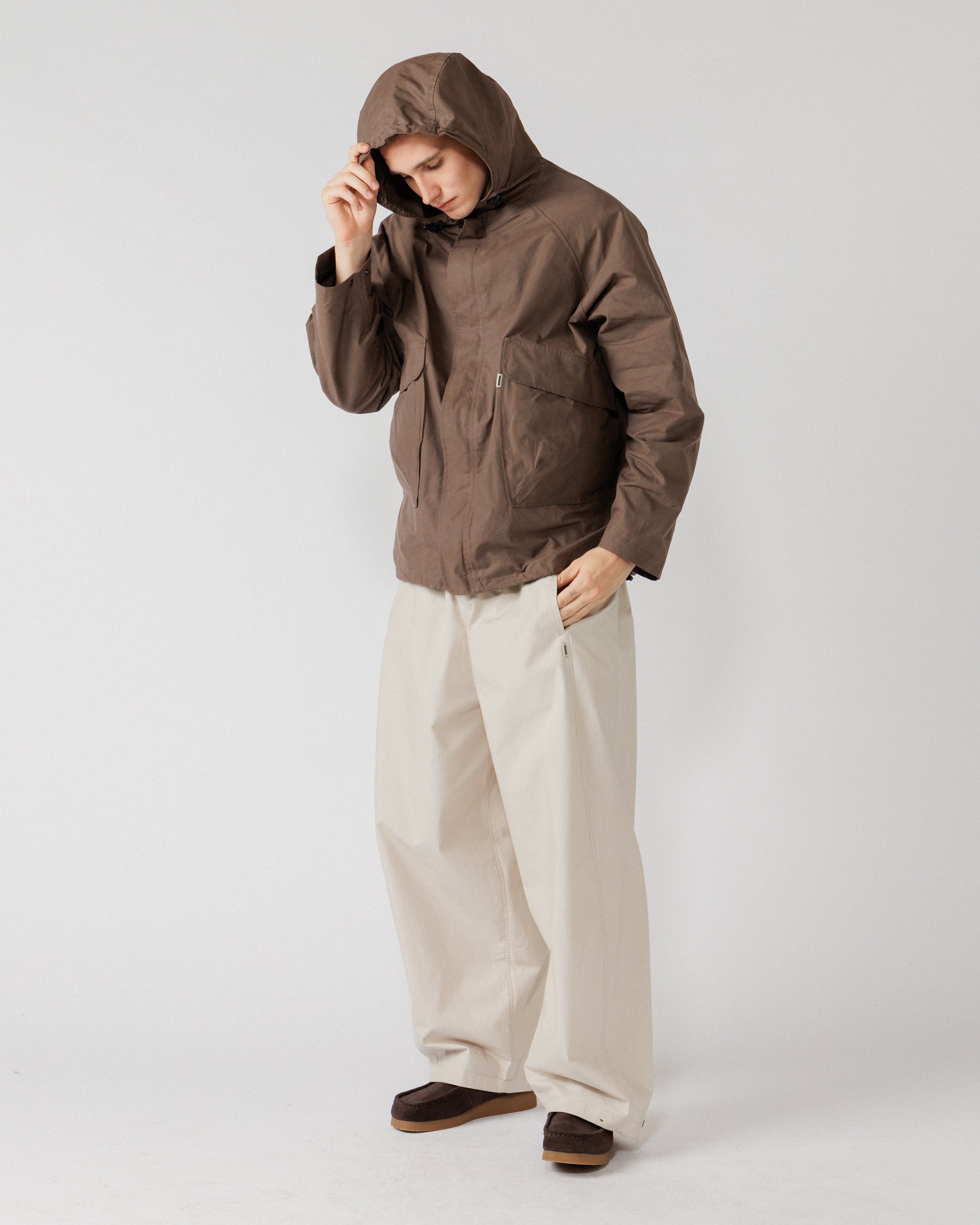 Roam Raglan Jacket - Bracken — hood-up front, shows coverage