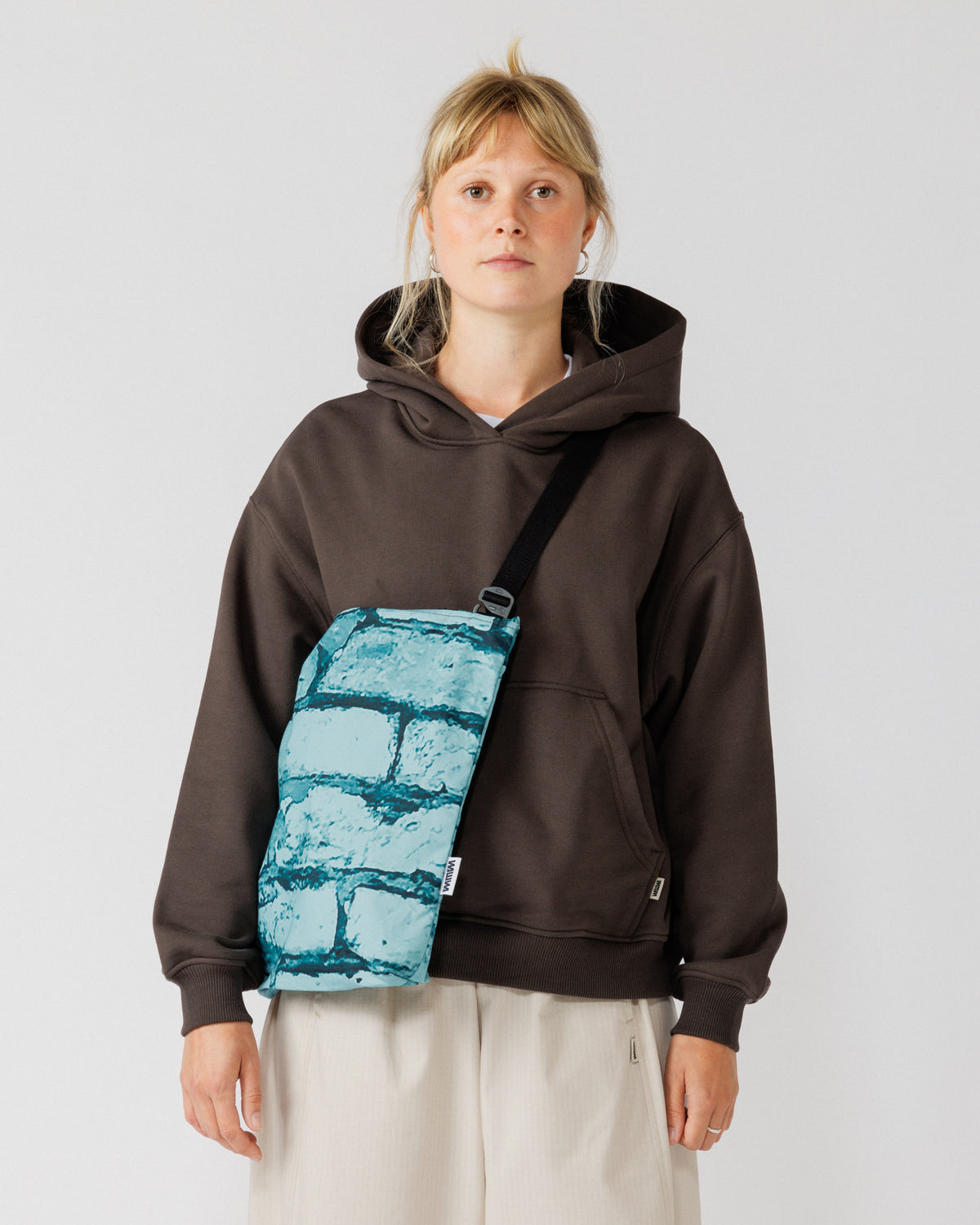Water Resistant Messenger Bag - Blue Brick Camo — worn cross-body front, best framing