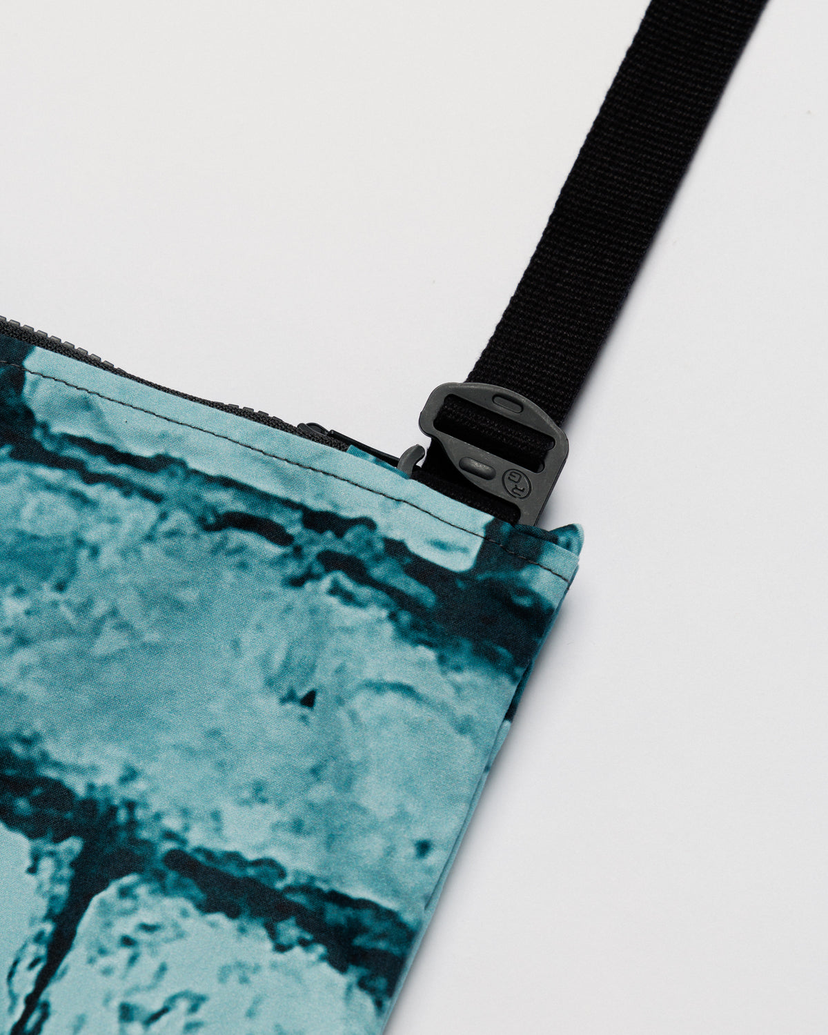 Water Resistant Messenger Bag - Blue Brick Camo — buckle, strap, zip hardware