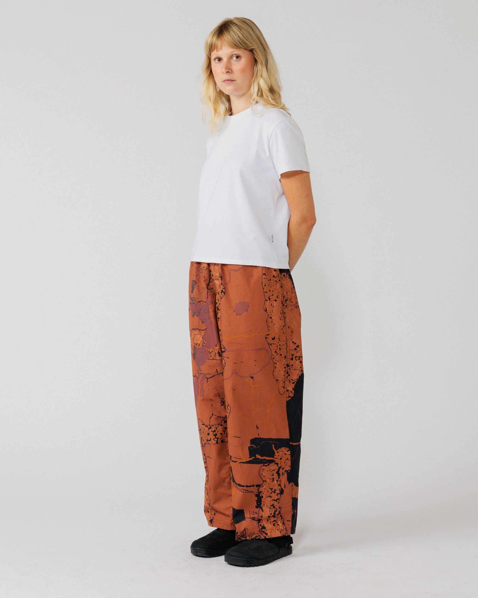 Water Resistant Zama Pants - Abstract Brick Camo — 3/4 angle on second fit