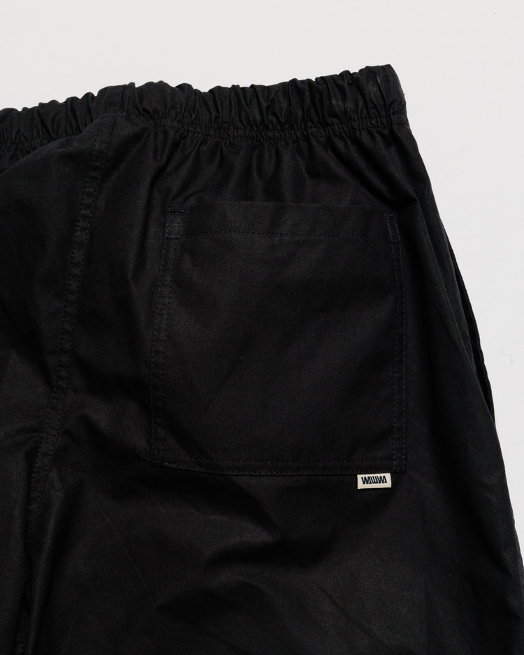 Water Resistant Zama Pants - Black — back pocket label detail